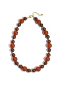 Necklace with beads of different sizes